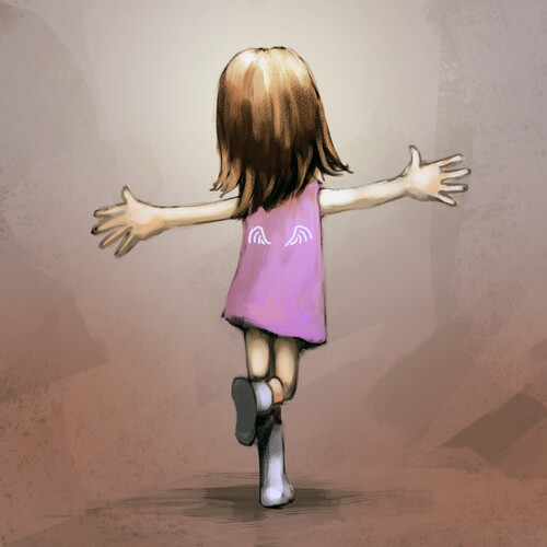 Niña con un vestido rosa feliz y bailando