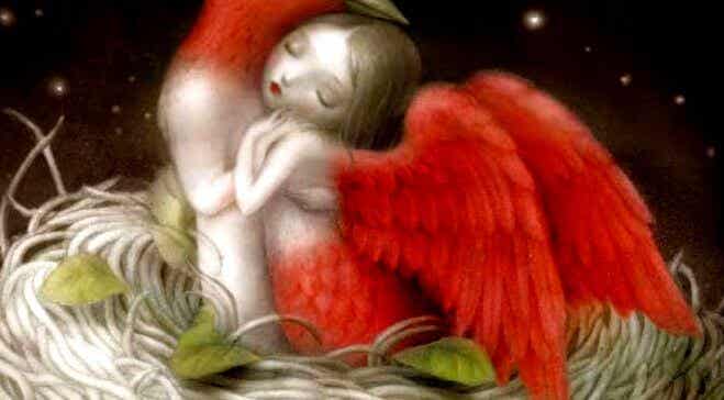 mujer con alas rojas abrazada