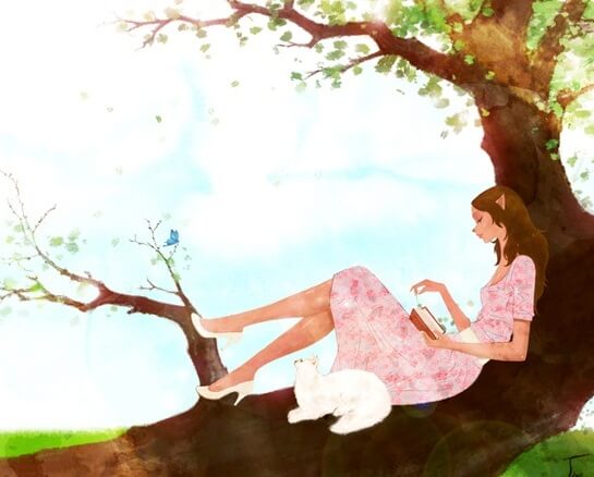mujer leyendo junto a un gato blanco