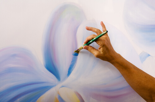 Mano pintando un cuadro, pintura