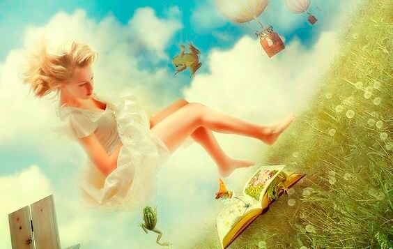 chica con vestido blanco sobre un libro