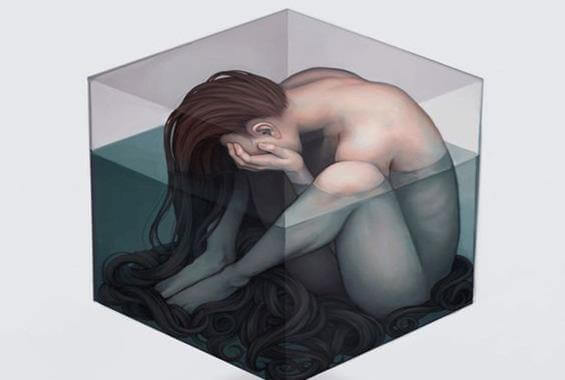 mujer triste en un cubo
