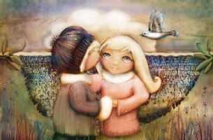 Niño dando un beso a su amiga