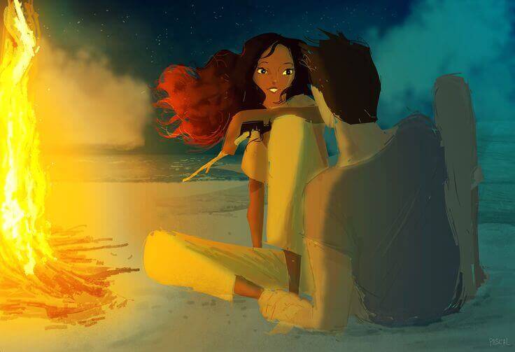 Pareja enamorada a la luz de la hoguera