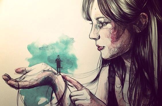 Mujer con hombre diminuto en la mano