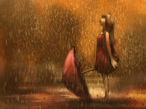 Chica mirando la lluvia
