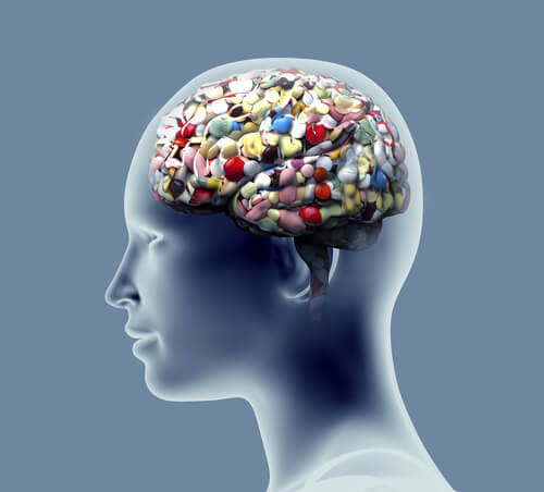 Perfil de una cabeza llena de pastillas