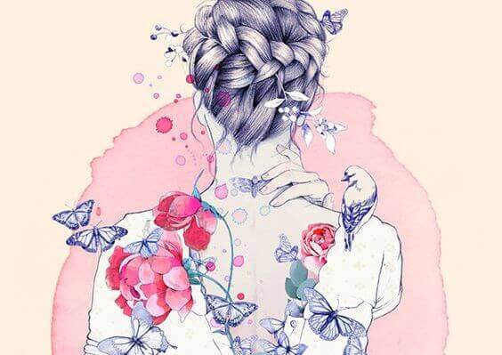 Mujer con flores sintiendo caricias
