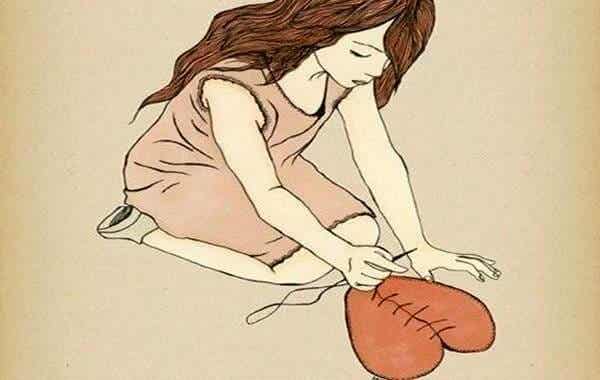 girl sewing heart