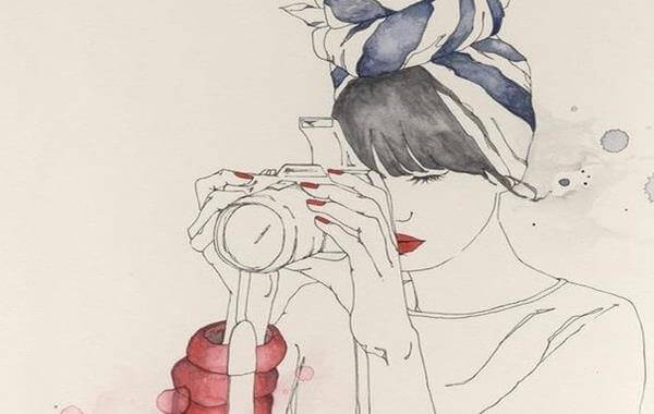 Mujer con cámara de fotos