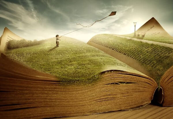 tiny boy on book