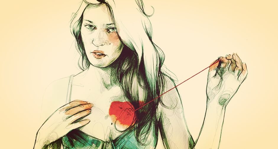 femme touchant son coeur
