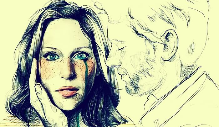 man holding woman's face