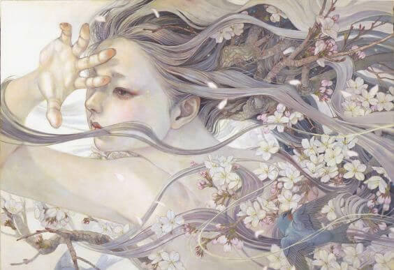 mujer con flores sanando heridas