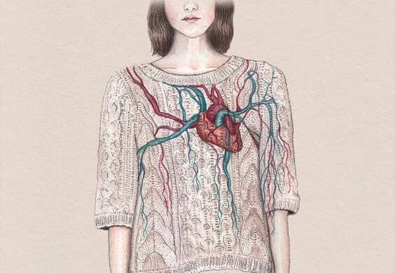 Woman with a heart on her chest symbolizing things that make us feel alive.