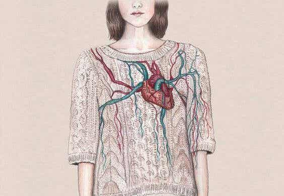 Woman with a heart on her chest symbolizing things that make us feel alive.