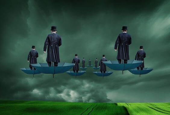 Hombres sobre paraguas representando la mente pobre