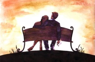 Pareja sentada en un banco