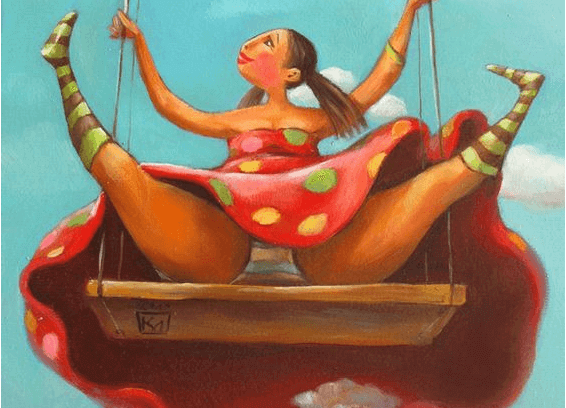 Mujer feliz en un columpio