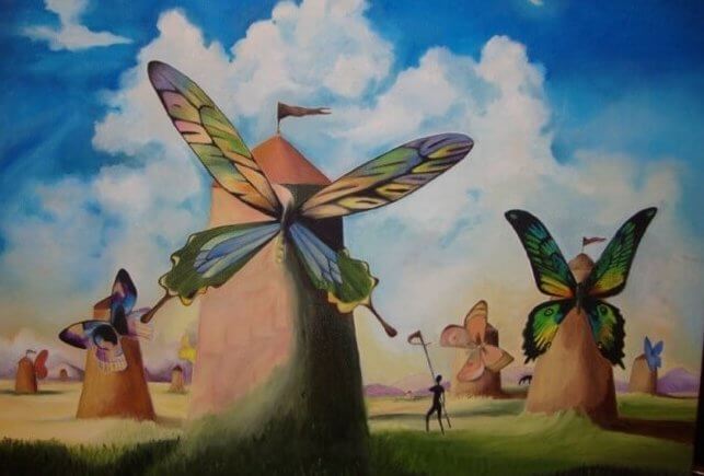 Molinos con alas de mariposa representando las frases para superar la tristeza