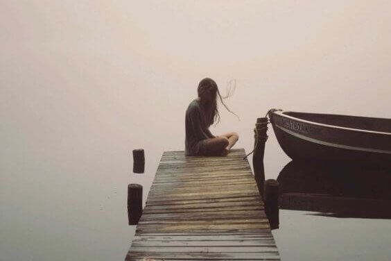 Silent woman with a boat suffers from Reactive Depression