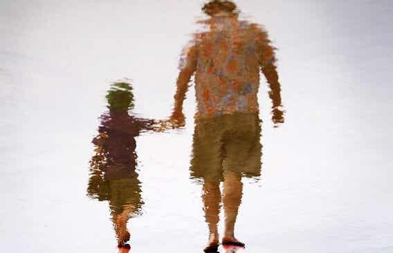 Blurred daughter and father, representing fathers who abandon their children.