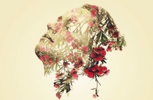 Mujer con flores en la cara simulando emociones