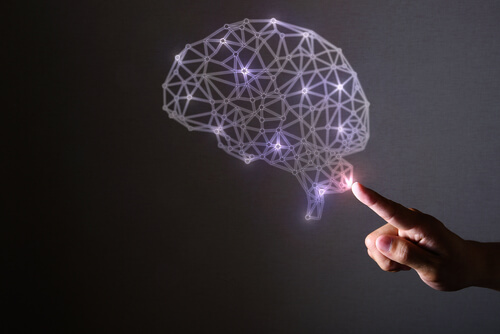Mano señalando un cerebro con luces representando la ciencia de la neurofelicidad