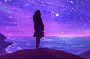 chica mirando estrellas frente al mar preguntándose cuando conseguiré mis objetivos