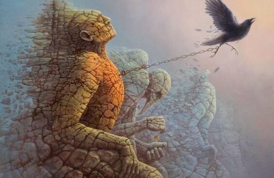 hombre de piedra anclado a cadena tirada de un pájaro