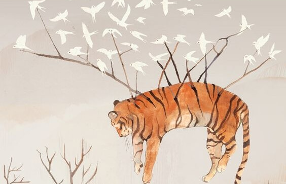 tigre en el aire llevado por pájaros