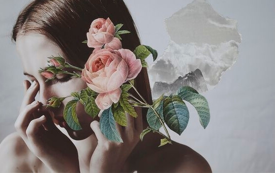 mujer con flor en el rostro
