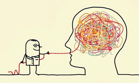 hombre que saca hilos de una cabeza representando el arte de estudiar psicología