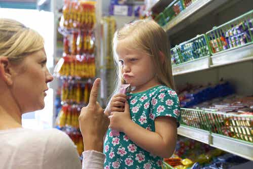 Mother scolding her daughter for tantrums