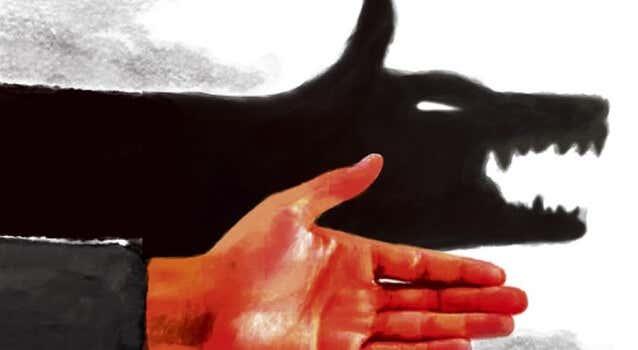 mano con sombra de animal de las personas autoritarias