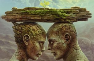Pareja bajo bloque de piedra donde se alza la flor de la confianza
