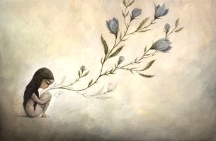 Niña sentada y prendida por ramo de flores