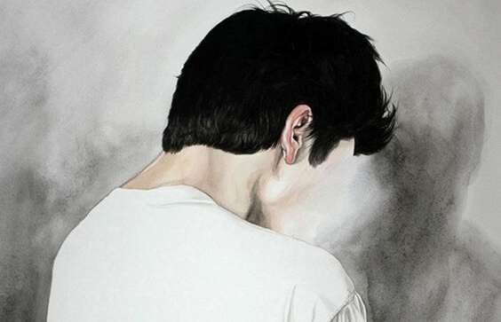 chico de espaldas ante su sombra representando el miedo a perder el control