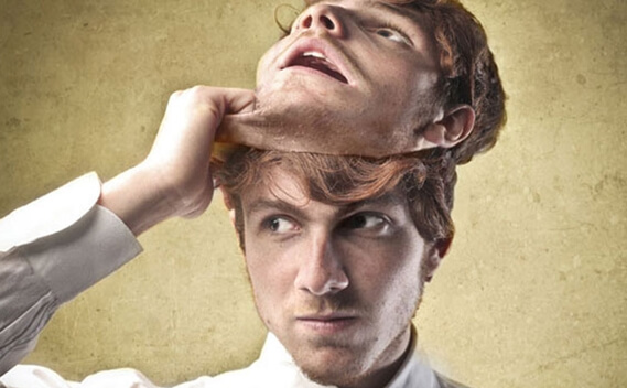 man taking off mask