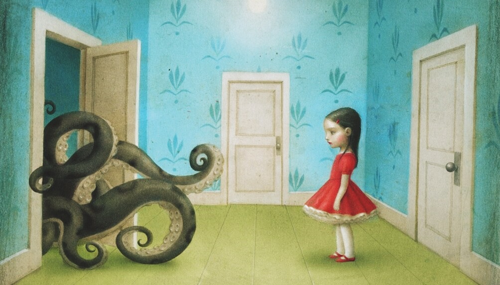 Niña mirando a un pulpo