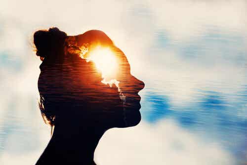 Woman with sun and clouds in her head.