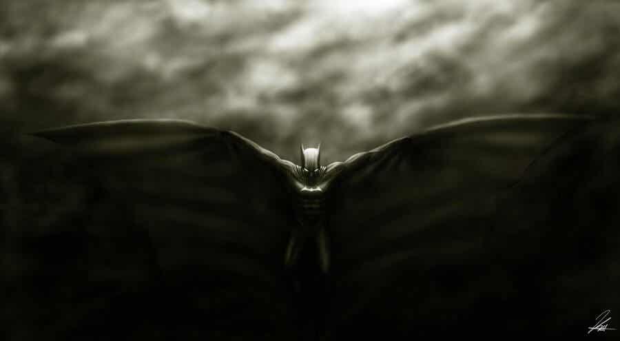 Batman con capa extendida