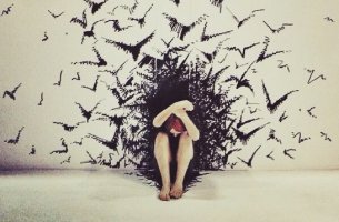 mujer envuelta en pájaros sufriendo el efecto de los tomadores emocionales
