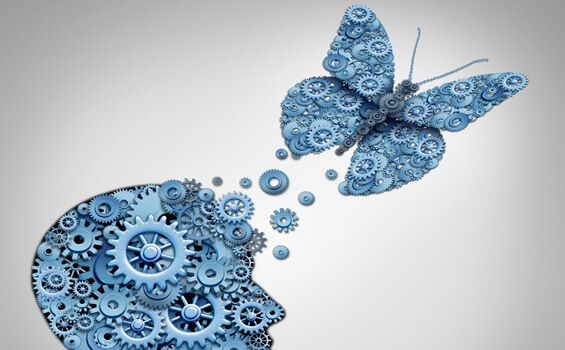 Head with butterfly coming out of it.