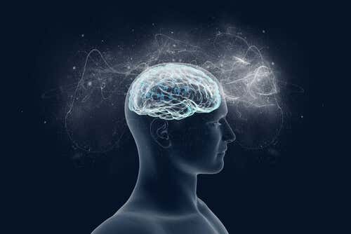 Cerebro iluminando la mente de una persona representando los bloqueos mentales