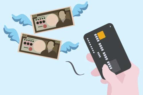 dinero y tarjeta de crédito simbolizando el síndrome del saldo en rojo
