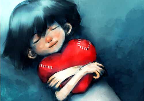 niña abrazada a corazón simbolizando la Tenacidad mental