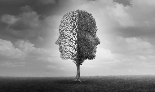 Árbol con caras en blanco y negro para representar la patología dual