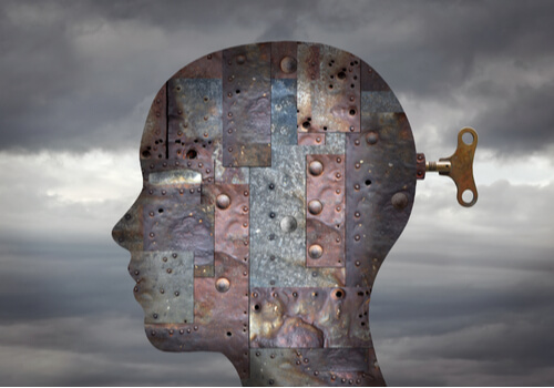 Rostro mecánico representando parálisis del análisis