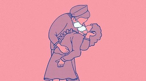 Pareja con mascarilla representando que el mundo necesita más besos